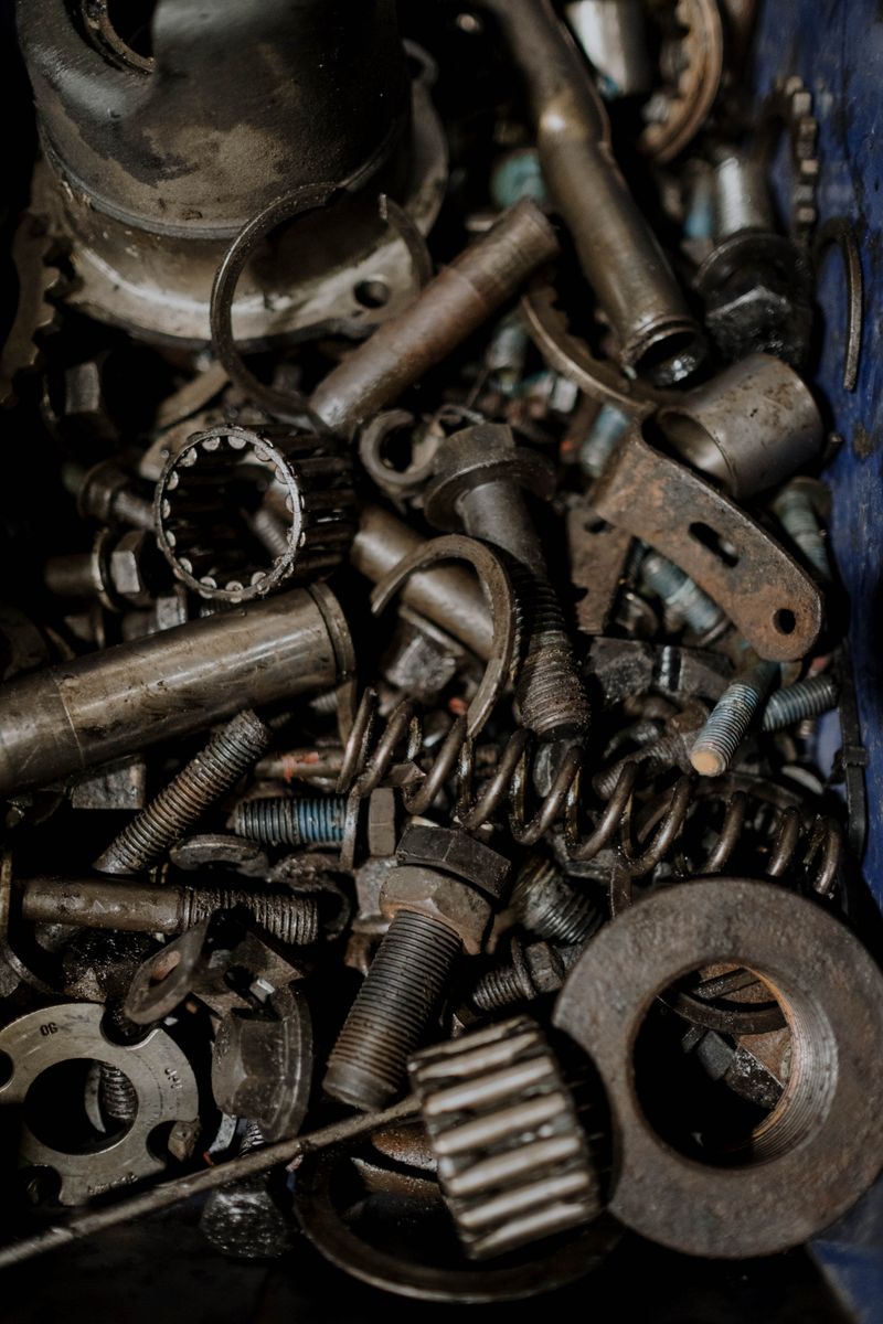Assorted metal spare parts — illustrative stock photo