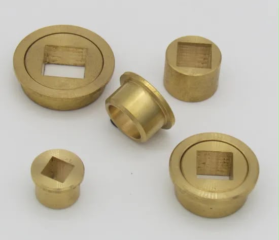 Brass-colored bushes with square openings